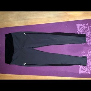 Lululemon size 10 leggings with mesh sides and zippered back pocket
